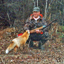 outfitter fisherman with friendly fox